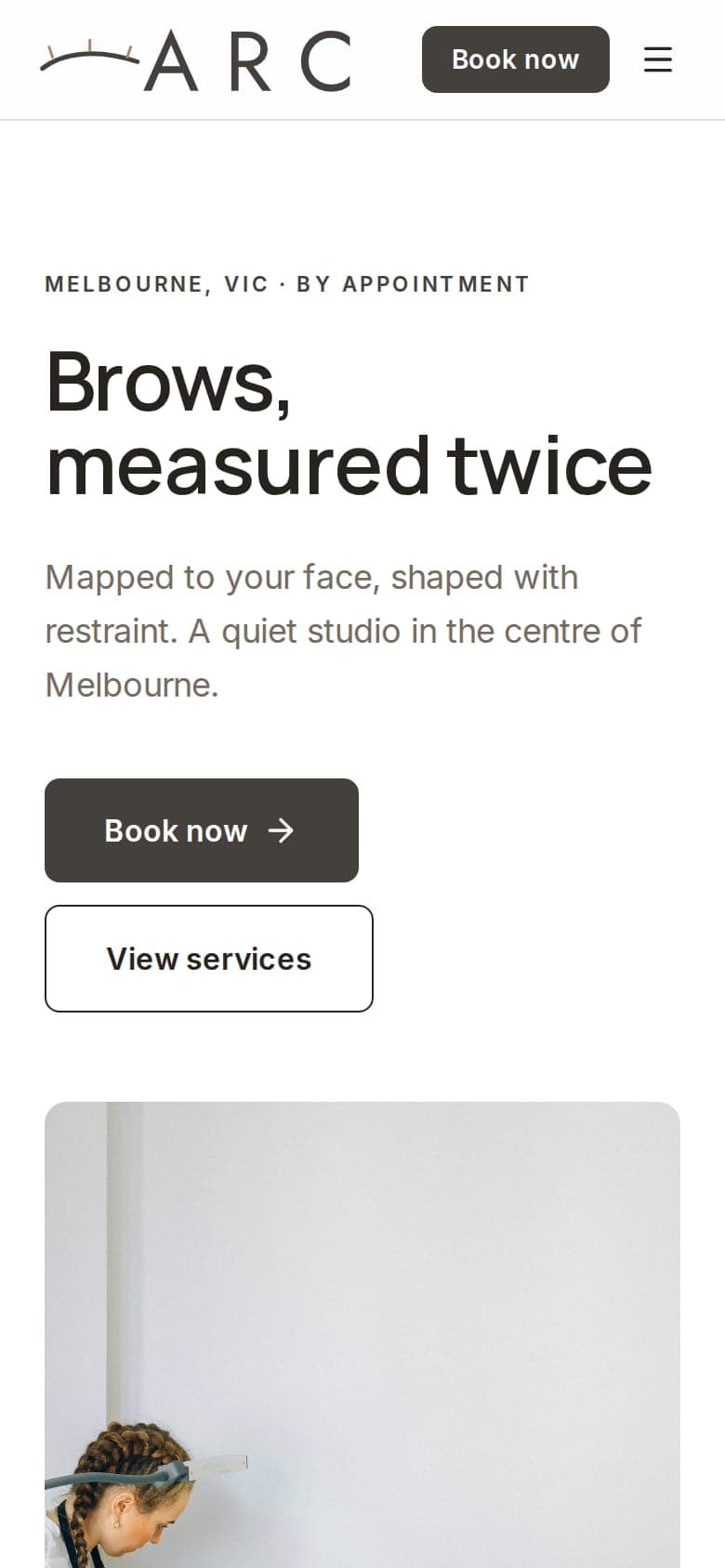 Arc Brow Studio website on a phone