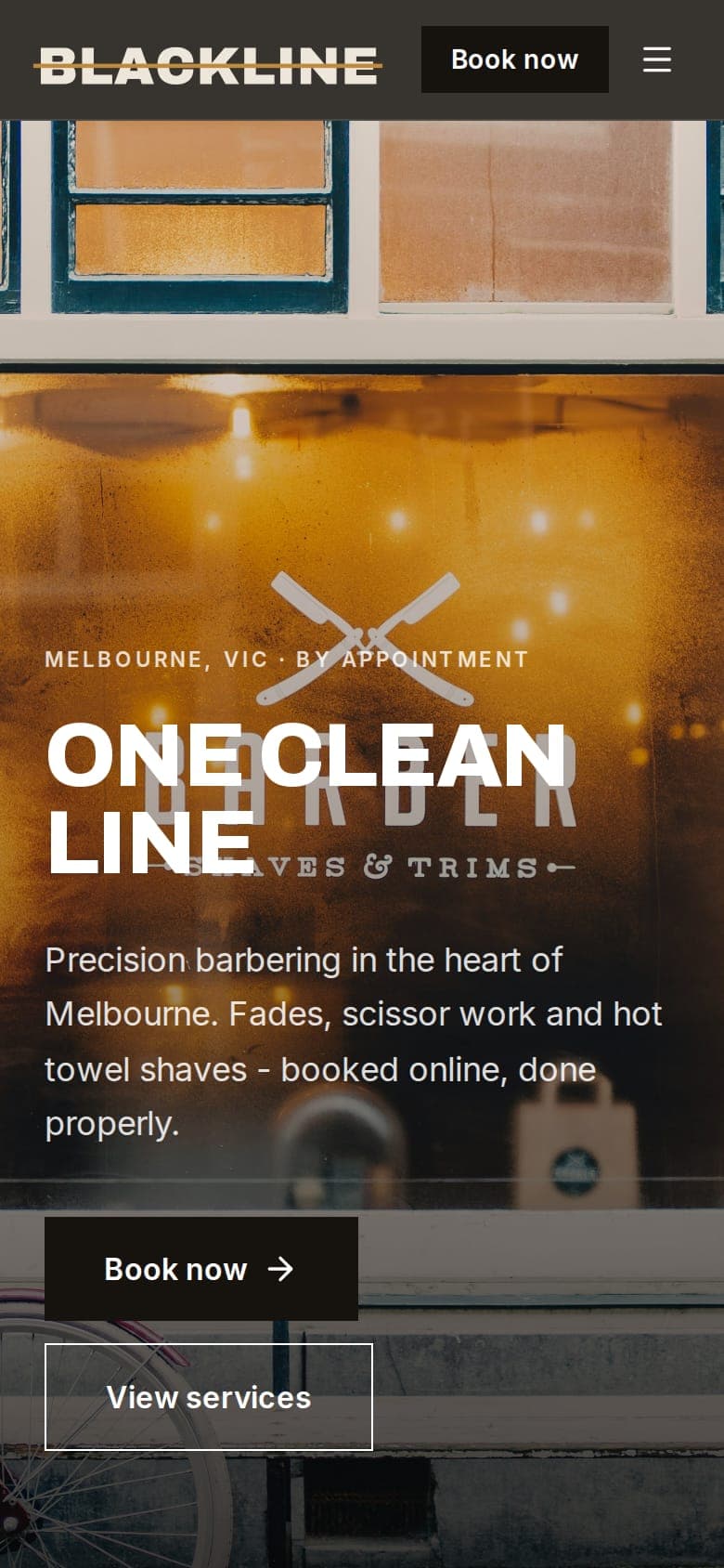 Blackline Barbers website on a phone