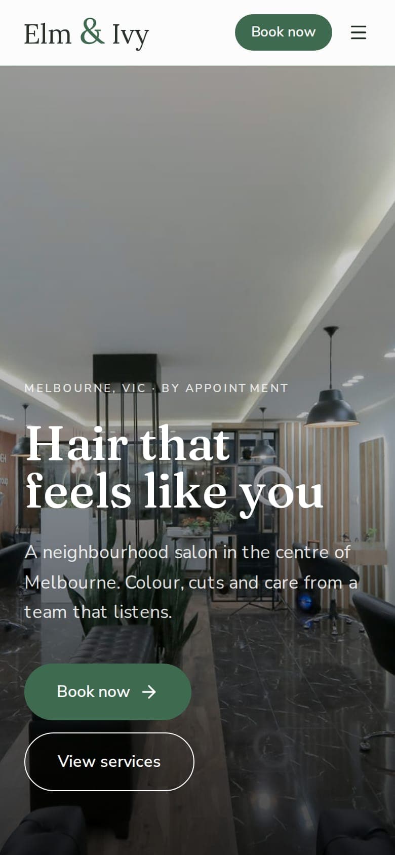 Elm & Ivy Hair Co website on a phone