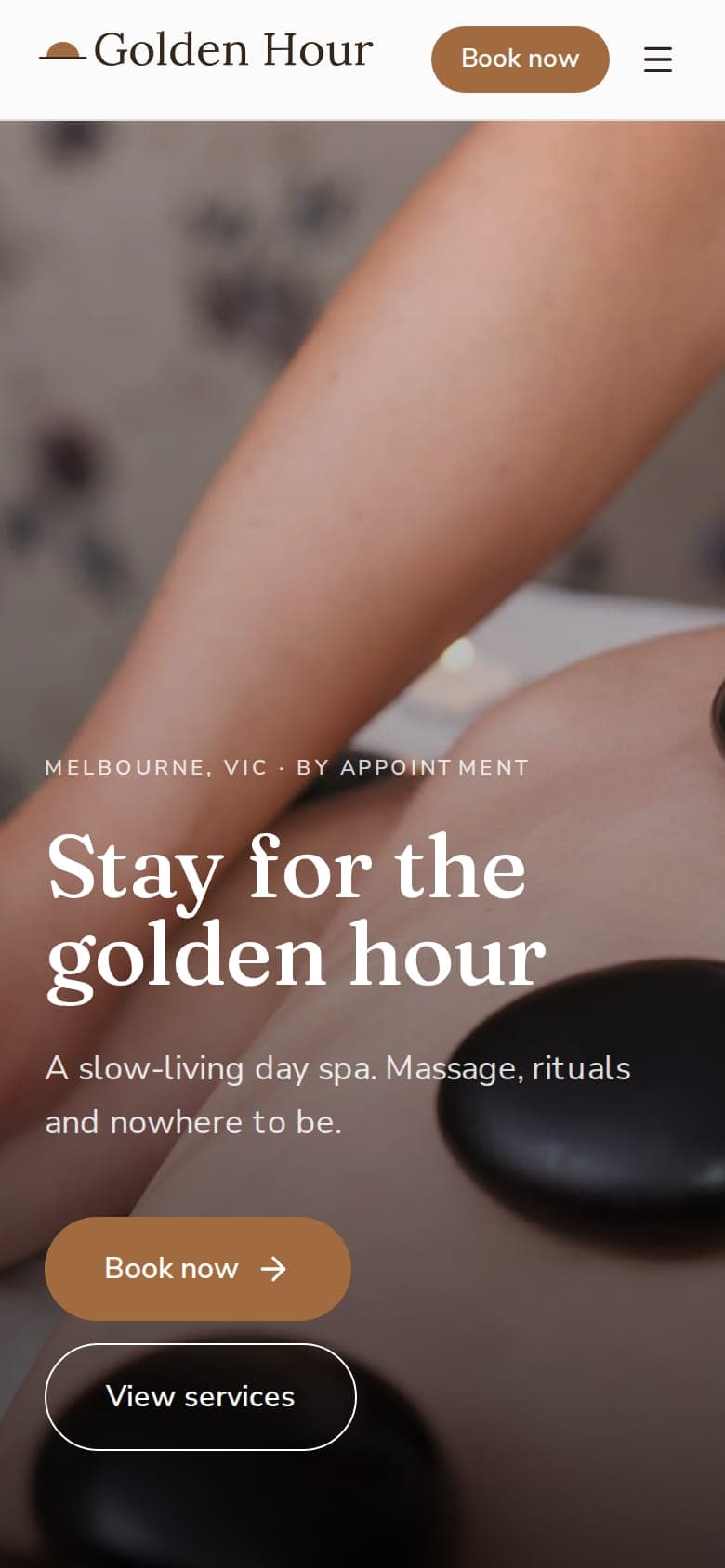 Golden Hour Day Spa website on a phone